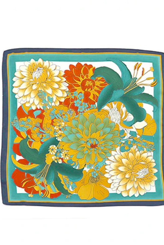 Floral scarf with a blue border on a white background