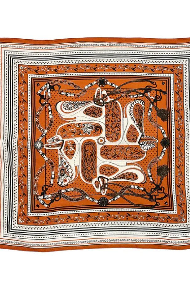 Decorative square scarf with intricate patterns on a white background