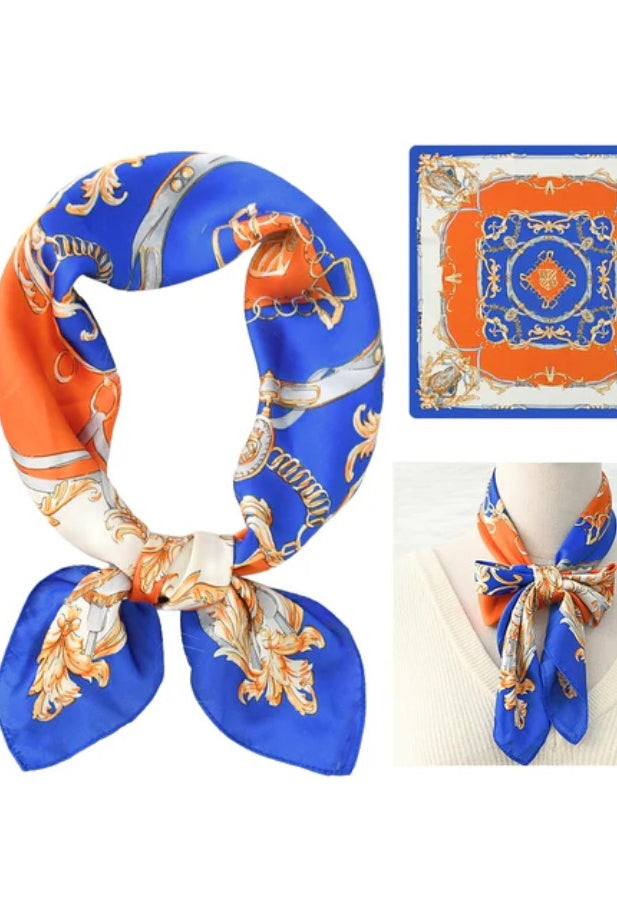 Colorful scarf with blue and orange patterns on a white background