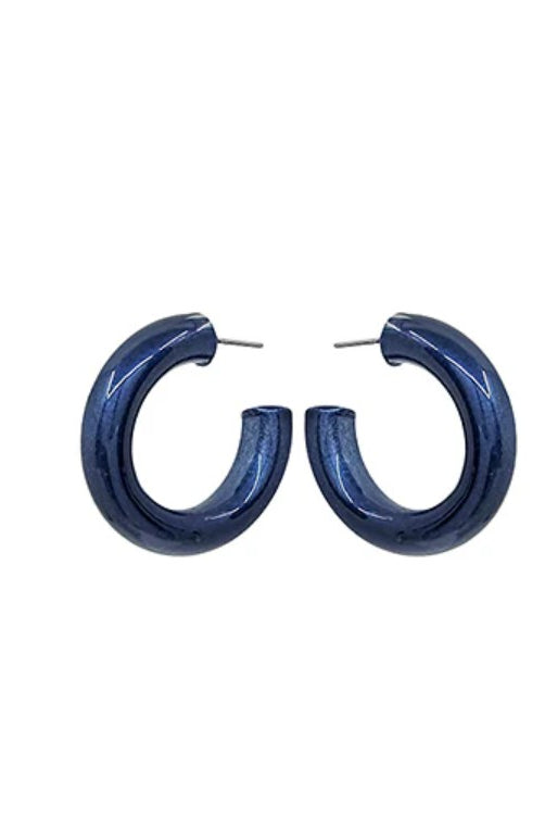Blue hoop earrings on a white background