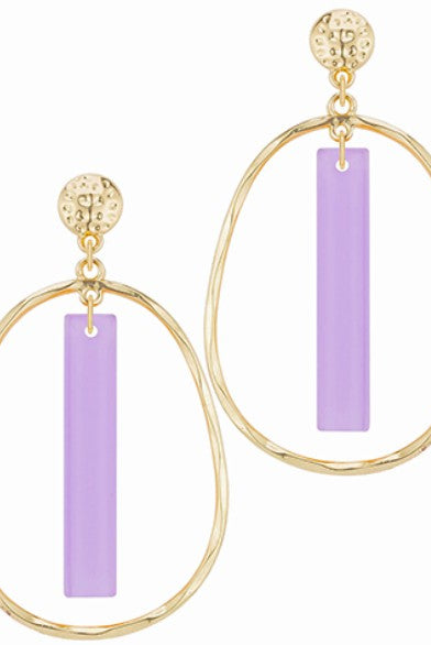 Gold hoop earrings with purple bars on a white background