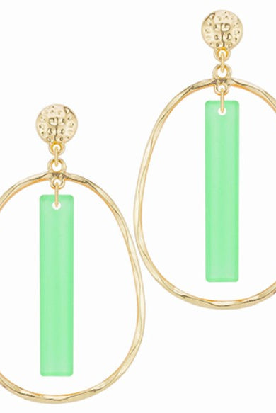 Gold hoop earrings with green rectangular stones on a white background