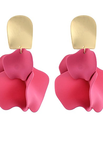 Pink earrings with gold hooks on a white background