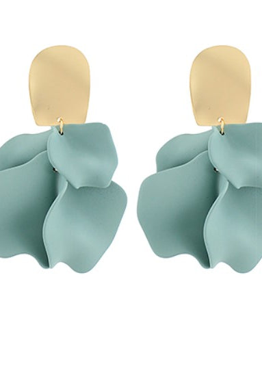 Pair of light blue earrings with gold hooks on a white background