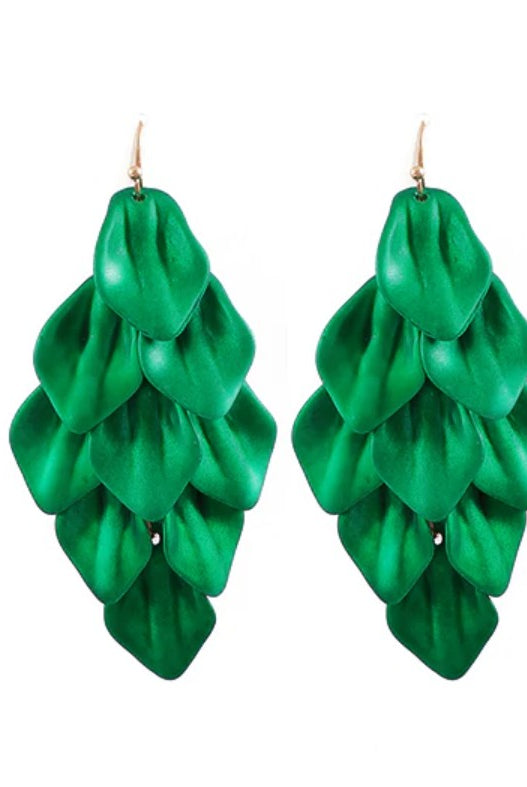 Pair of green leaf-shaped earrings on a white background