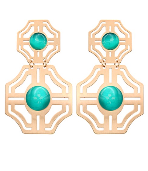 Gold earrings with turquoise stones on a white background