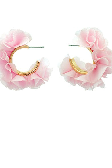 Pink floral hoop earrings on a white background
