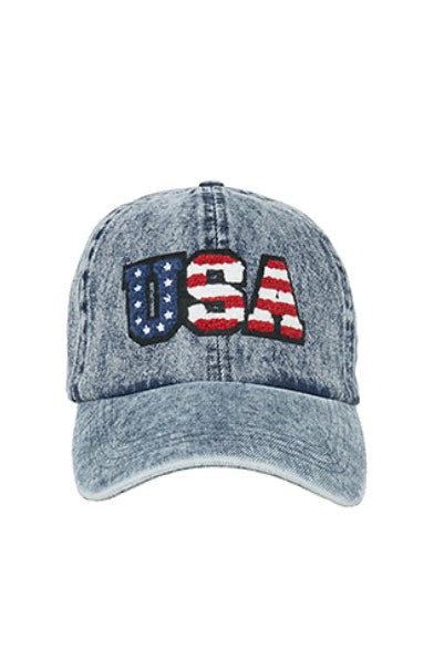 Denim cap with USA flag patch on a white background