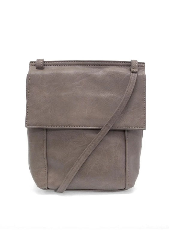 Brown leather crossbody bag on a white background