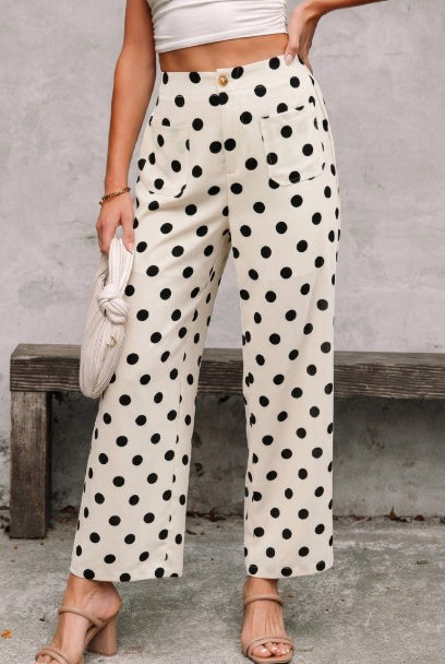 Person wearing polka dot pants.
