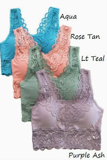 Four lace-trimmed tops in different colors with color labels on a white background.