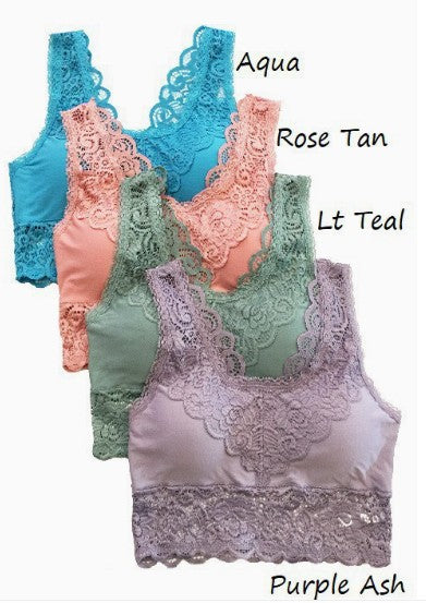 Four lace-trimmed tops in different colors with color labels on a white background.