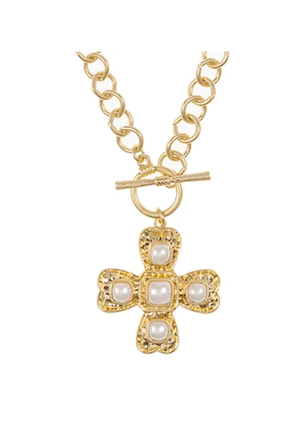 A gold-tone chain necklace with a toggle clasp and a decorative cross pendant featuring five white faux pearls set in an ornate gold-tone frame, shown on a plain white background.