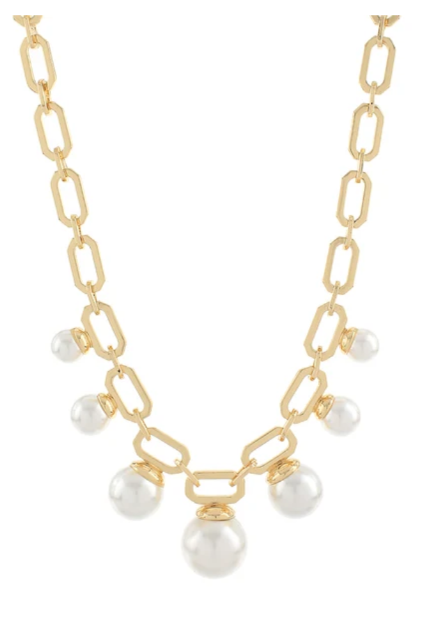 A gold chain necklace featuring elongated oval links and several dangling white pearl beads arranged in a V-shape at the center, shown against a plain white background.