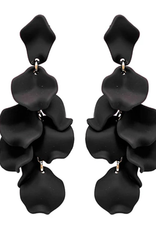 Black petal-shaped earrings on a white background