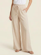 Beige wide-leg pants worn by a person 