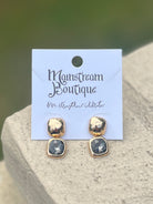 Pair of gold and grey stone earrings.