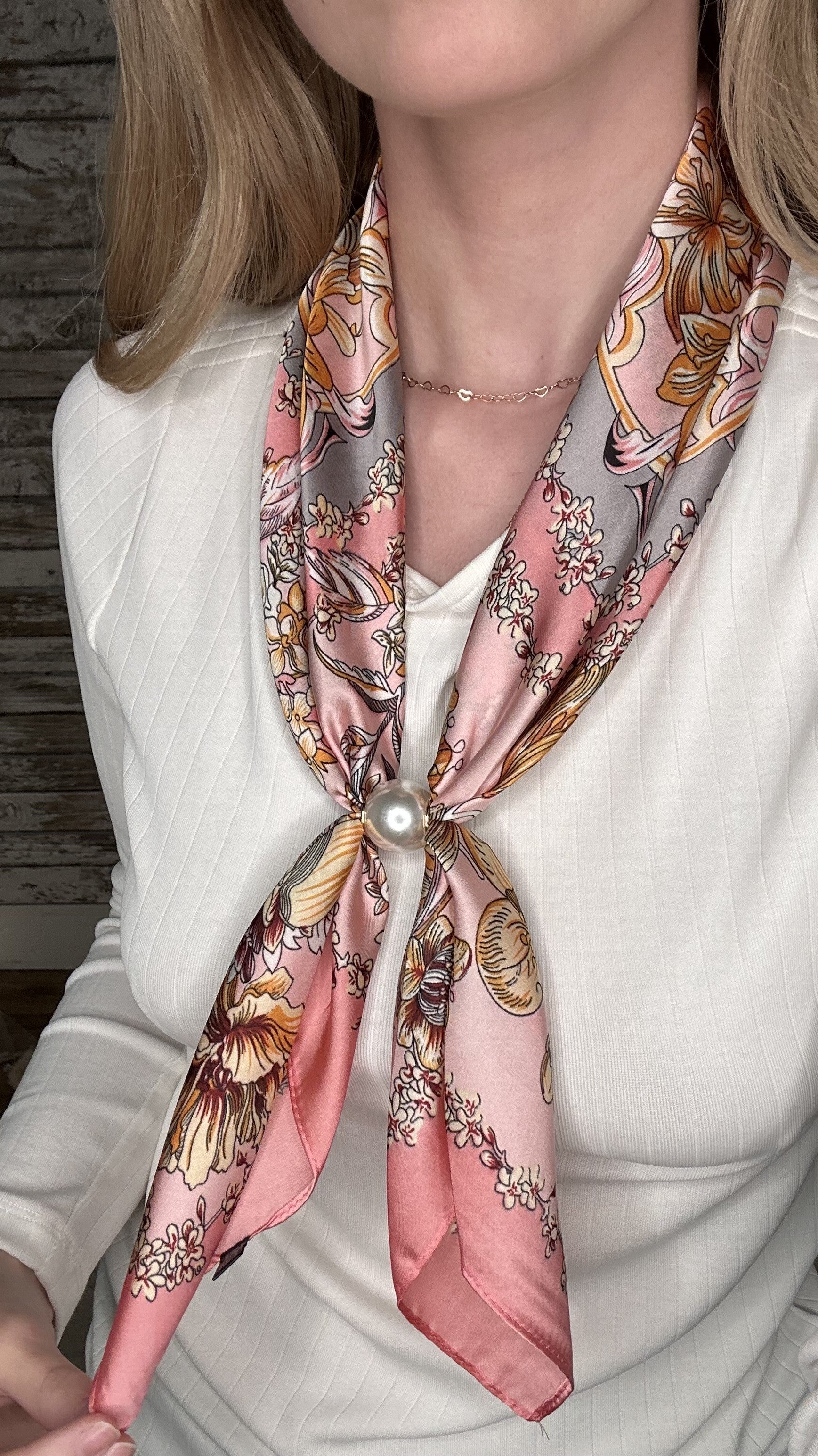 Silky blush pink pearl magnetic scarf featuring a vintage floral print with warm neutral accents and elegant pearl clasp detail.