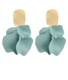 Pair of light blue earrings with gold hooks on a white background
