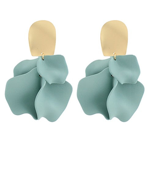 Pair of light blue earrings with gold hooks on a white background