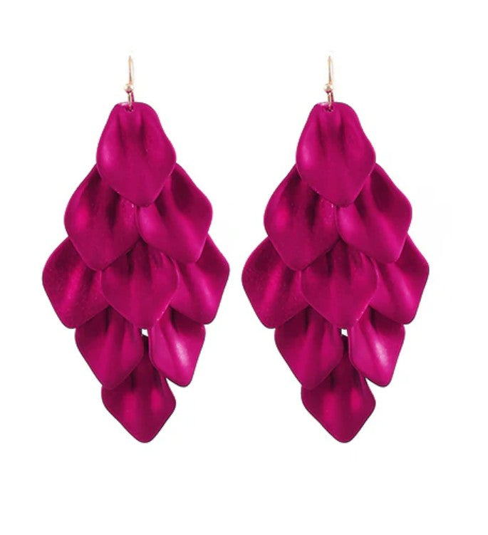 Pair of pink layered petal earrings on a white background