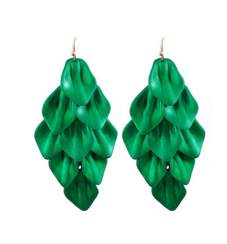 Pair of green leaf-shaped earrings on a white background