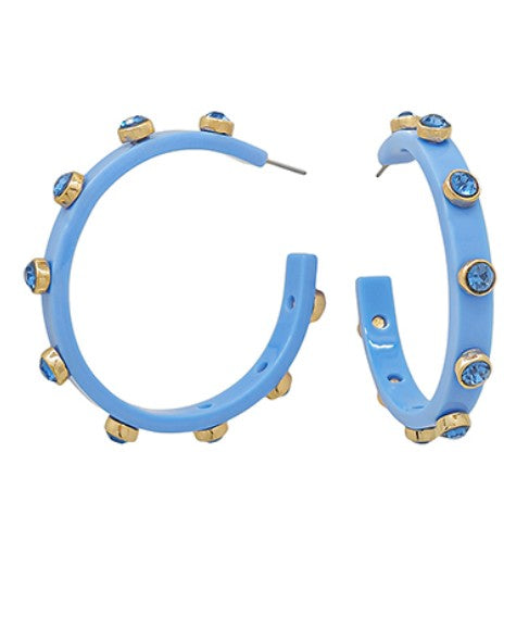 Blue hoop earrings with gold accents on a white background