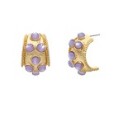 Gold hoop earrings with lavender stones on a white background