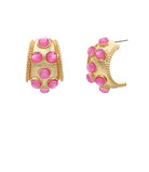 Gold hoop earrings with pink gemstones on a white background