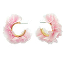 Pink floral hoop earrings on a white background