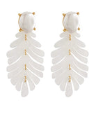 White feather-like earrings with gold accents on a white background