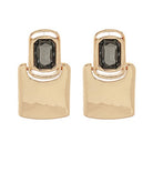 Gold hoop earrings with black gemstones on a white background