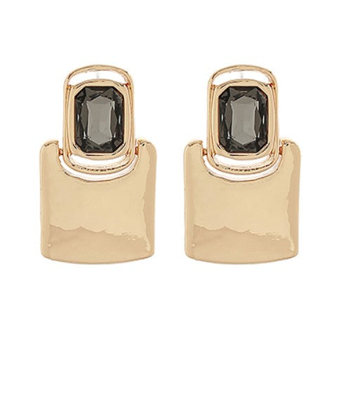 Gold hoop earrings with black gemstones on a white background