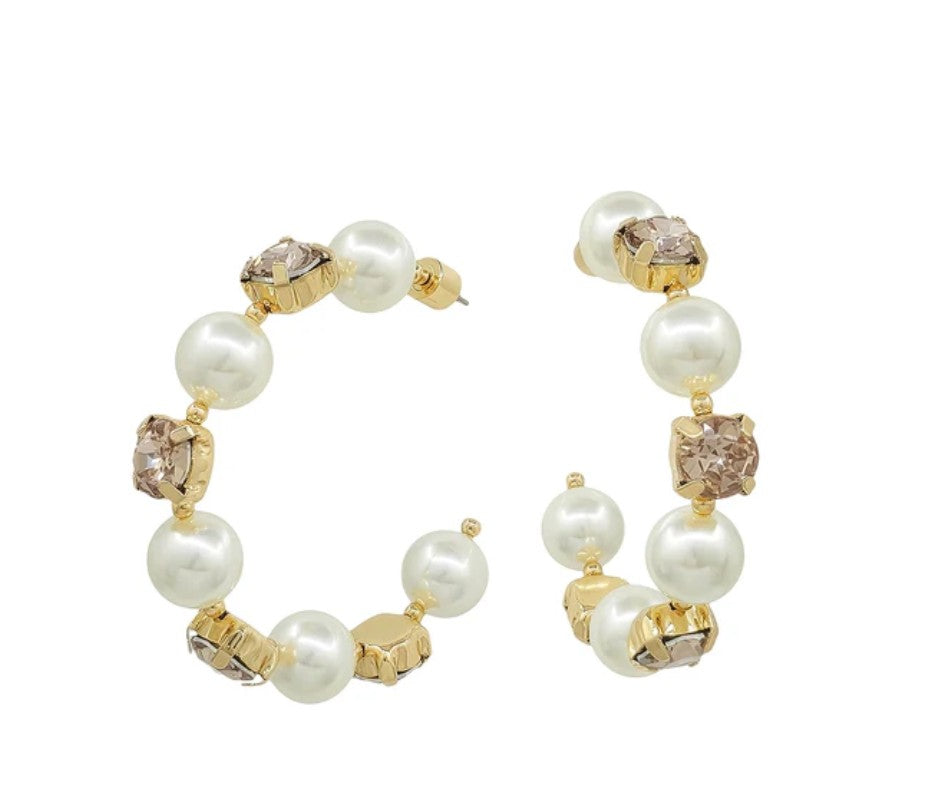 Pair of hoop earrings with pearls and gold accents on a white background