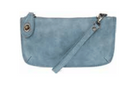 Blue suede clutch bag with a strap on a white background