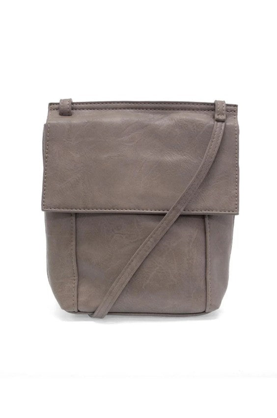 Brown leather crossbody bag on a white background