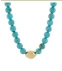 Turquoise beaded necklace with a gold pendant on a white background