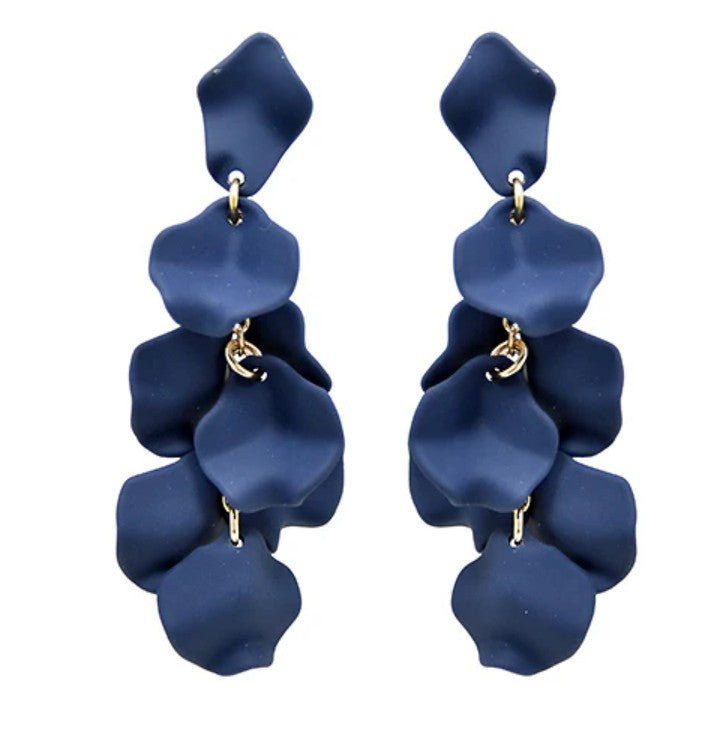 Pair of blue petal-shaped earrings on a white background