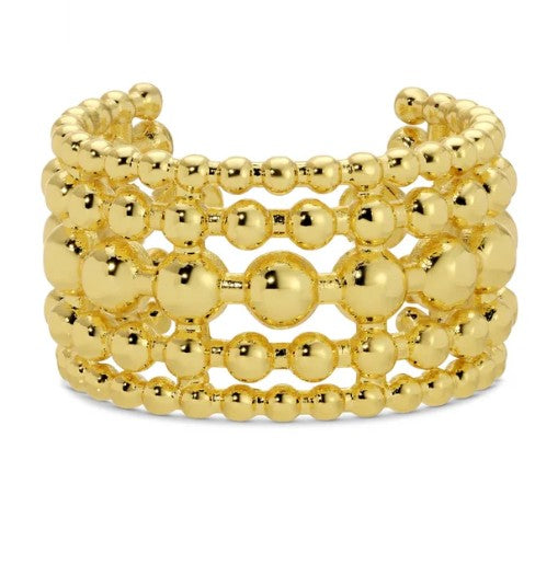 Gold beaded ring on a white background