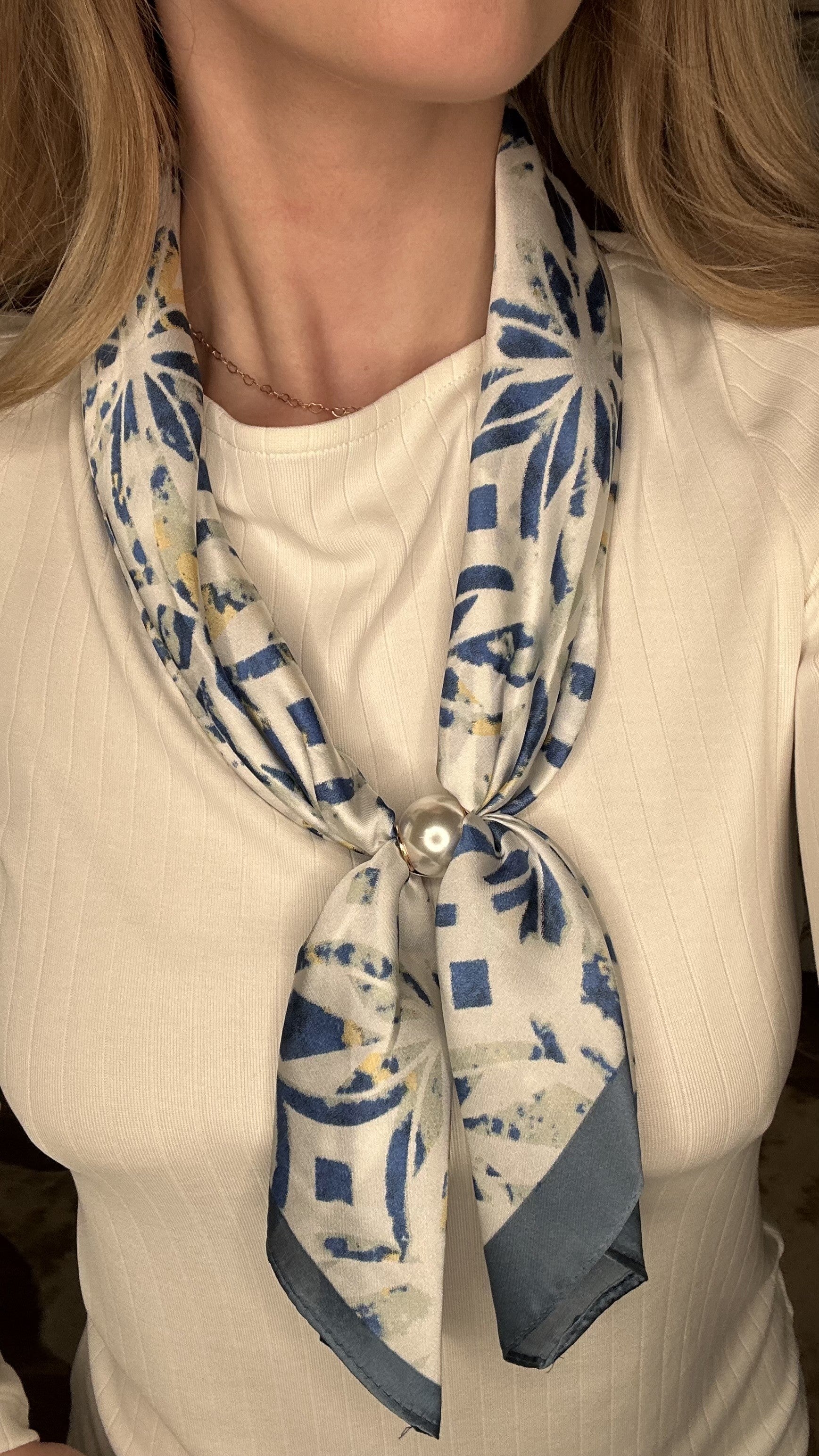 Silky royal blue abstract pearl magnetic scarf with soft geometric patterns and elegant pearl clasp detail.