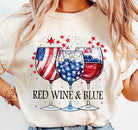 White t-shirt with red, white, and blue wine glass design and 'Red Wine & Blue' text.