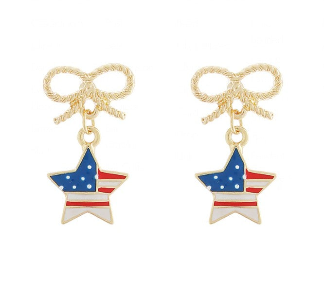 Pair of earrings with American flag star design and gold bows on a white background