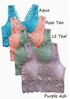 Four lace-trimmed tops in different colors with color labels on a white background.