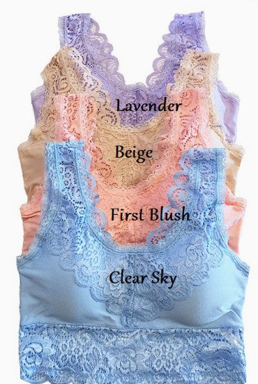 Lace tank top with color swatches labeled 'Lavender', 'Beige', 'First Blush', and 'Clear Sky' on a white background.