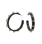 A pair of black hoop earrings embellished with small gold studs and round gold-toned beads, shown on a plain white background.