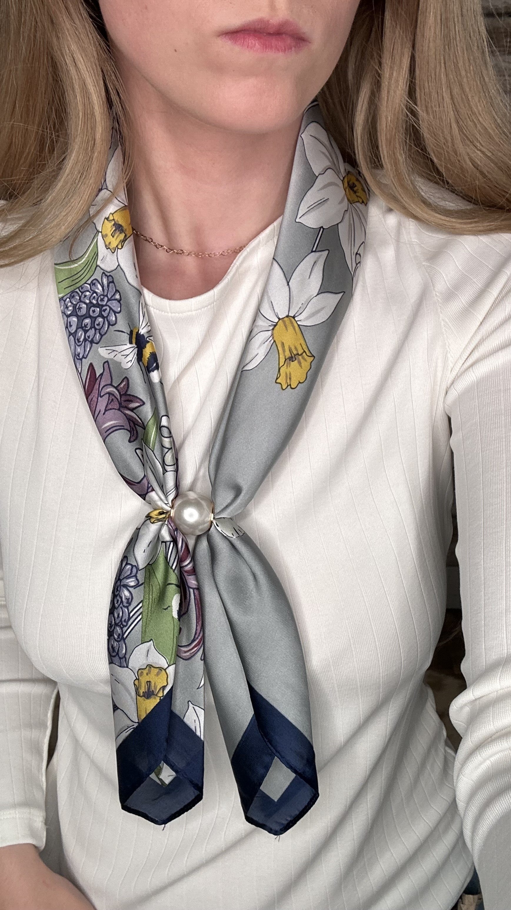 Silky lavender floral pearl magnetic scarf featuring daffodil and botanical prints with a satin finish and pearl clasp accent.